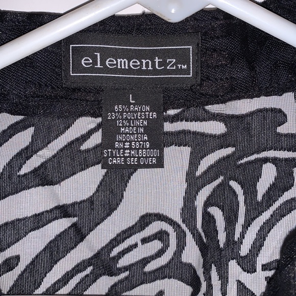 Elemenz ladies blouse. Large floral type see thru print. Black and sheer. - Picture 4 of 5